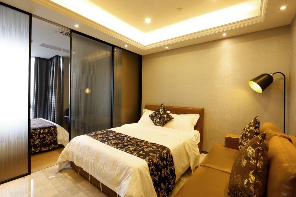 Boman Holiday Apartment Bei Jing lu Jie Deng Du Hui Branch Guangzhou Exterior foto